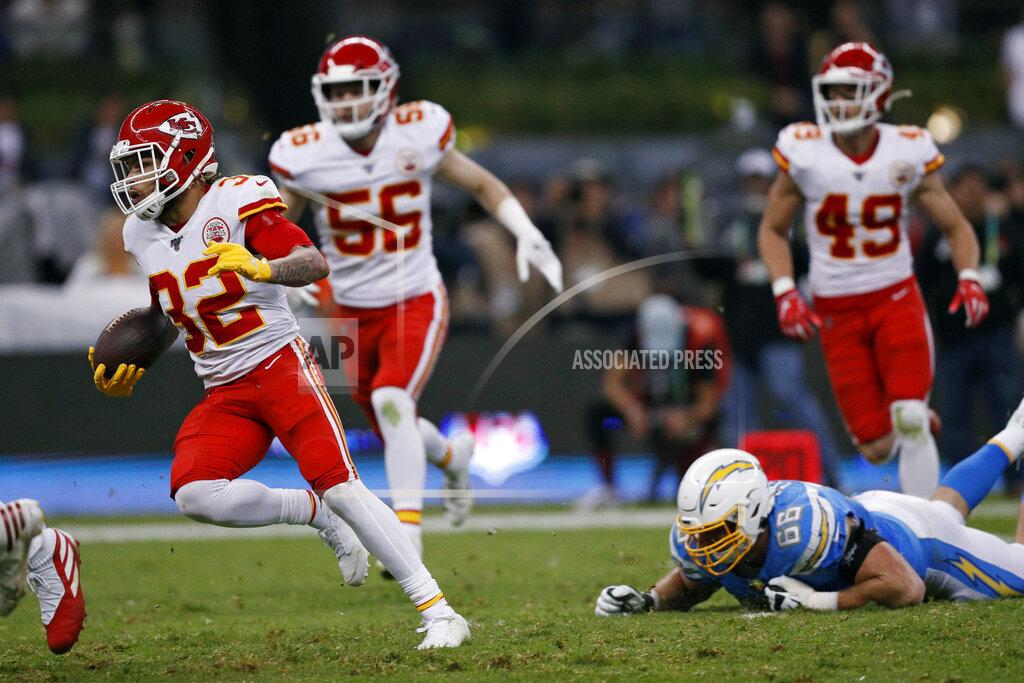 Rebecca Blackwell Kansas City Chiefs strong safety Tyrann Mathieu, right, runs after an interception during the first half of an NFL football game against the Los Angeles Chargers, Monday, Nov. 18, 2019, in Mexico City. (AP Photo/Rebecca Blackwell)