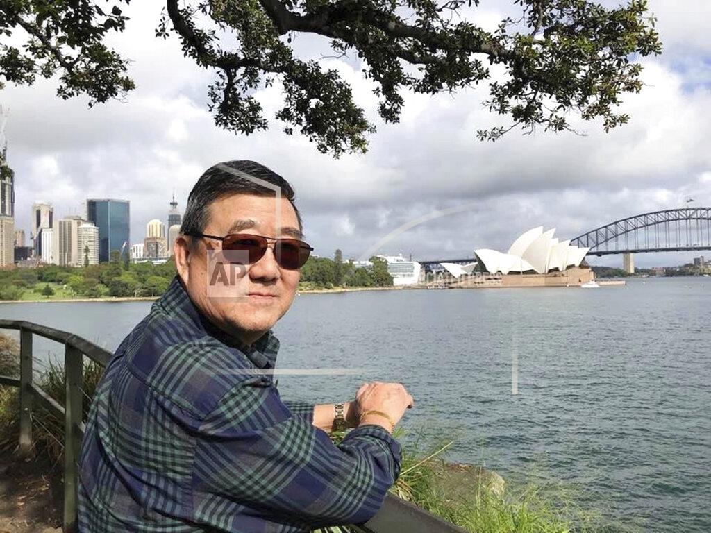 Lu Wang This March 2020 photo provided by the family shows Ming Wang in Sydney, Australia. The 71-year-old was sickened in March on a cruise from Australia with his wife, a break after decades of running the family’s Chinese restaurant in Papillion, Neb. In the 74 days he was hospitalized, doctors desperately tried various experimental approaches, including enrolling him in a study of an antiviral drug that ultimately showed promise. Ming died on June 8. “It was just touch and go. Everything they wanted to try we said yes, do it,” said his daughter, Anne Peterson. “We would give anything to have him back, but if what we and he went through would help future patients, that’s what we want.” (Lu Wang via AP)