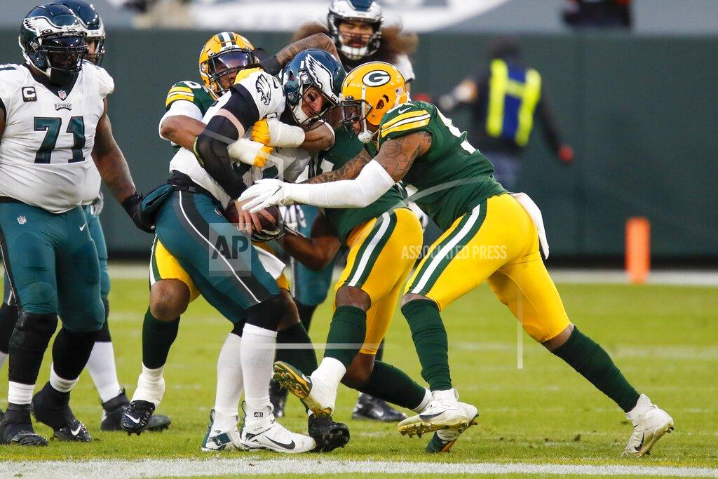 Matt Ludtke Philadelphia Eagles' Carson Wentz is sacked during the first half of an NFL football game against the Green Bay Packers Sunday, Dec. 6, 2020, in Green Bay, Wis. (AP Photo/Matt Ludtke)