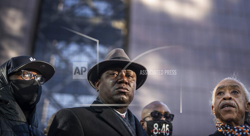 Jerry Holt From left, Terrence Floyd, brother of George Floyd; attorney Ben Crump; Philonise Floyd, brother of George Floyd, and the Rev. Al Sharpton hold a news conference at the Hennepin County Government Center in Minneapolis, Minn., on the first day of the Derek Chauvin murder trial Monday, March 29, 2021. (Jerry Holt/Star Tribune via AP)