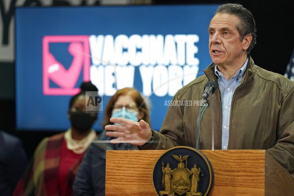 New York Gov. Andrew Cuomo speaks during a press conference before the opening of a mass COVID-19 vaccination site in the Queens borough of New York, Wednesday, Feb. 24, 2021. This FEMA run site, along with another in Brooklyn, gives priority to local residents in an effort to equitably distribute the vaccine. (AP Photo/Seth Wenig, Pool)