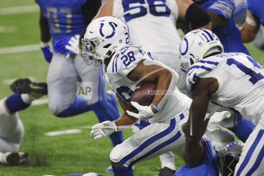 Tony Ding Indianapolis Colts running back Jonathan Taylor rushes during the first half of an NFL football game against the Detroit Lions, Sunday, Nov. 1, 2020, in Detroit. (AP Photo/Tony Ding)