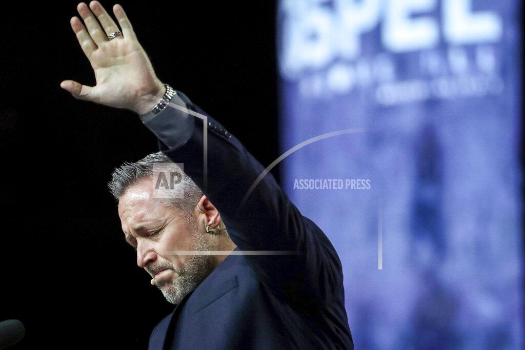 Jon Shapley FILE - In this Wednesday, June 12, 2019 file photo, J. D. Greear, president of the Southern Baptist Convention, talks about sexual abuse within the SBC on the second day of the SBC's annual meeting in Birmingham, Ala. On March 30, 2021, Greear posted a photo on Facebook of him getting the COVID-19 vaccine. It drew more than 1,100 comments — many of them voicing admiration, and many others assailing him. (Jon Shapley/Houston Chronicle via AP)