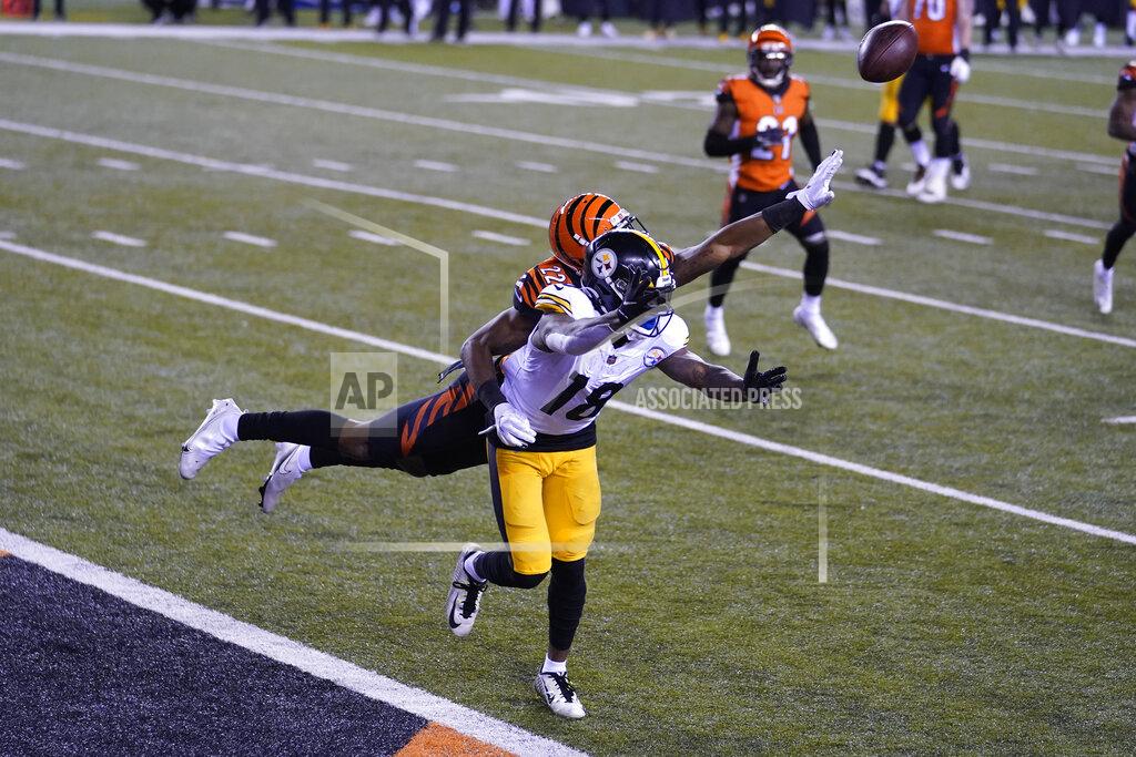 Michael Conroy Cincinnati Bengals' William Jackson (22) is called for pass interference against Pittsburgh Steelers' Diontae Johnson (18) during the second half of an NFL football game, Monday, Dec. 21, 2020, in Cincinnati. (AP Photo/Michael Conroy)