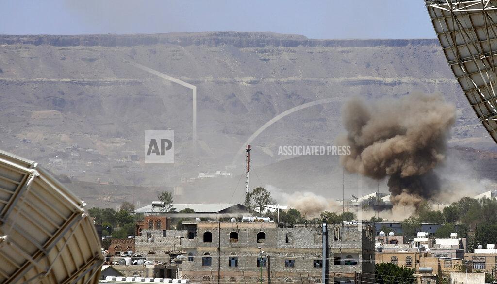 Hani Mohammed FILE - In this Sept. 9, 2015 file photo, smoke rises after an airstrike by the Saudi-led coalition on an army base in Sanaa, Yemen. Yemen’s war began in September 2014, when the Houthis seized the capital Sanaa. Saudi Arabia, along with the United Arab Emirates and other countries, entered the war alongside Yemen’s internationally recognized government in March 2015. The war has killed some 130,000 people and driven the Arab world’s poorest country to the brink of famine. (AP Photo/Hani Mohammed)