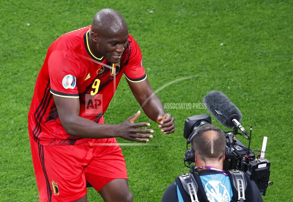 Anton Vaganov Belgium's Romelu Lukaku celebrates after scoring his sides first goal during the Euro 2020 soccer championship group B match between Russia and Belgium at the Saint Petersburg stadium in St. Petersburg, Russia, Saturday, June 12, 2021. (Anton Vaganov/Pool via AP)