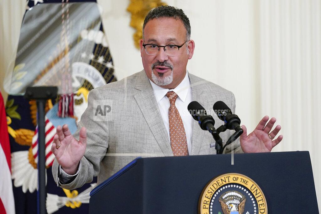 Susan Walsh FILE - Education Secretary Miguel Cardona speaks in the East Room of the White House in Washington, April 27, 2022. The Biden administration proposed a dramatic rewrite of campus sexual assault rules on Thursday, June 23, moving to expand protections for LGBTQ students, bolster the rights of victims and widen colleges' responsibilities in addressing sexual misconduct. The proposal was announced on the 50th anniversary of the Title IX women’s rights law. Cardona said Title IX has been “instrumental” in fighting sexual assault and violence in education. (AP Photo/Susan Walsh, File)