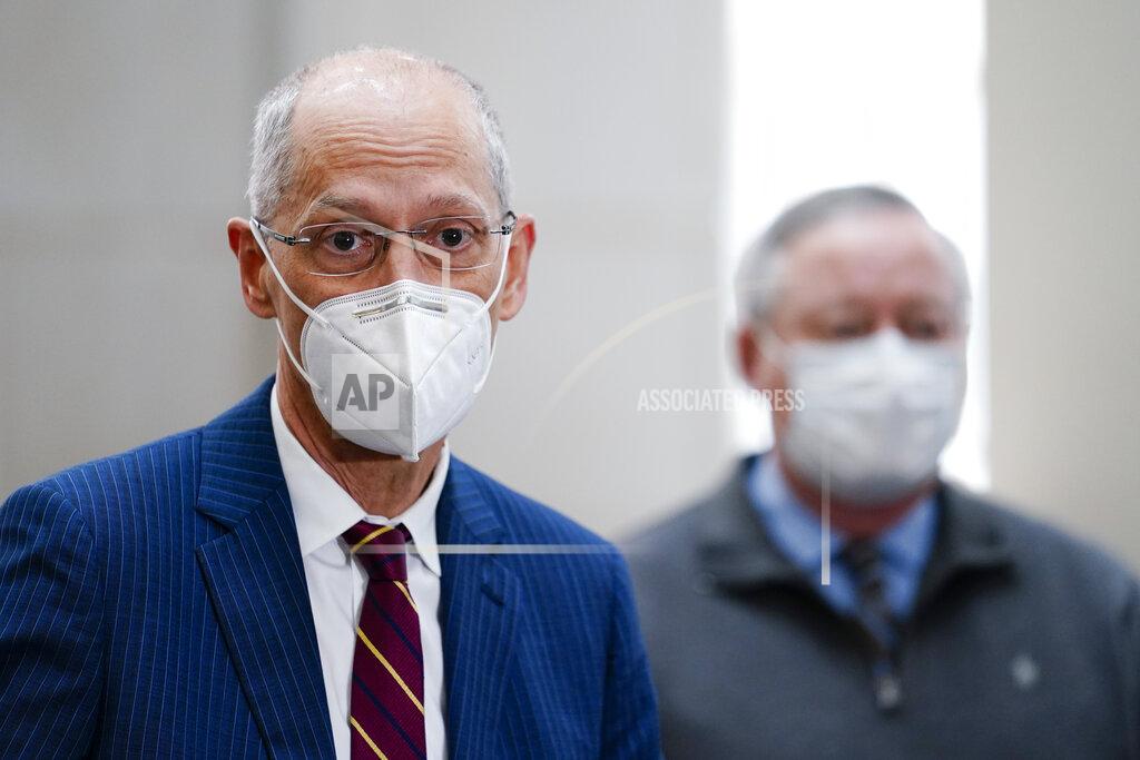 Matt Rourke Philadelphia Health commissioner Dr. Tom Farley, left, speaks with members of the media as Philadelphia Mayor Jim Kenney listens during a news conference at the Pennsylvania Convention Center in Philadelphia, Wednesday, Feb. 3, 2021. (AP Photo/Matt Rourke)