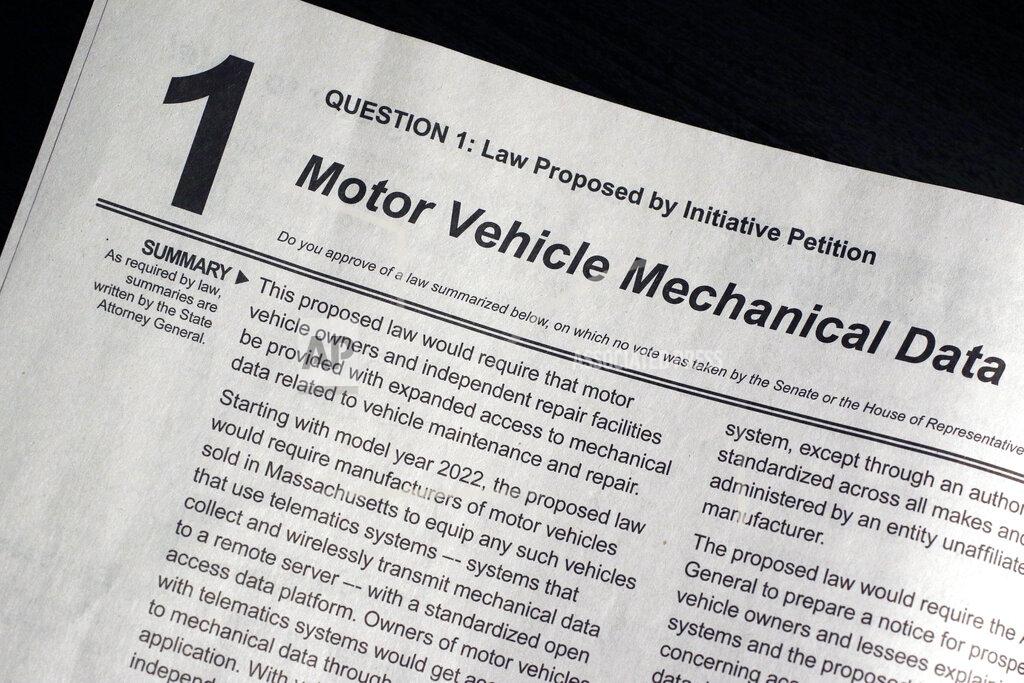 Bill Sikes FILE - In this Sept. 23, 2020, file photo, a summary of Ballot Question 1 on the Nov. 3 Massachusetts election ballot about access to motor vehicle data is displayed in Marlborough, Mass., in a handbook provided to voters by the Secretary of the Commonwealth. (AP Photo/Bill Sikes, File)