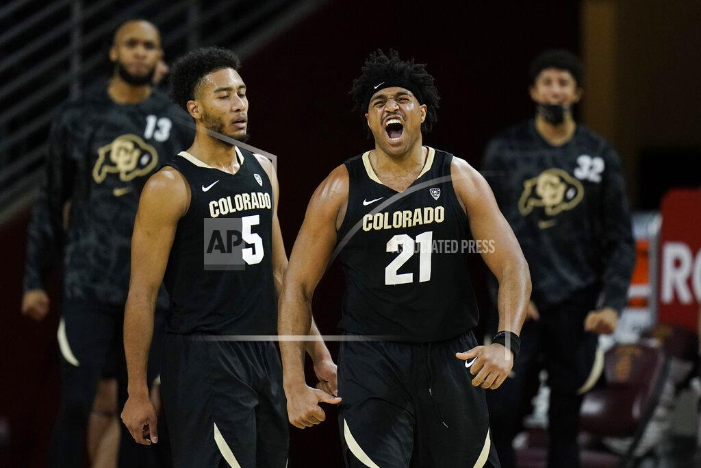 Jae C. Hong Colorado's Evan Battey celebrates his basket during the second half of the team's NCAA college basketball game against Southern California, Thursday, Dec. 31, 2020, in Los Angeles. Colorado won 72-62. (AP Photo/Jae C. Hong)