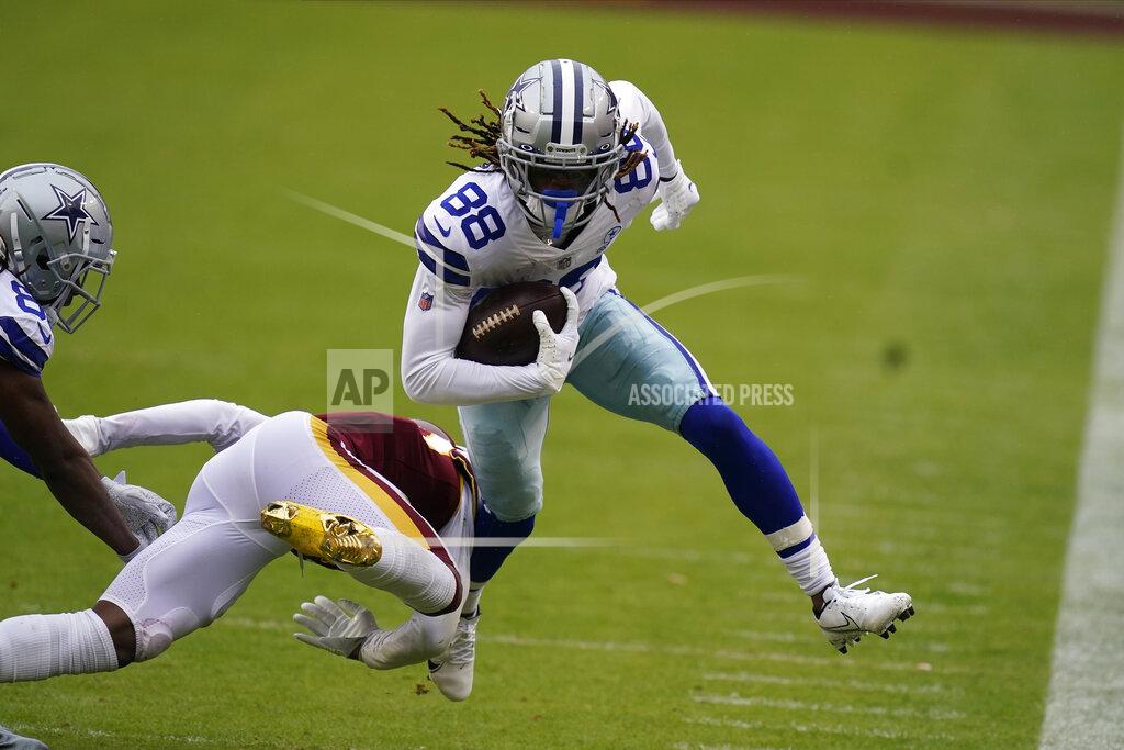 Patrick Semansky Dallas Cowboys wide receiver CeeDee Lamb (88) gets knocked out of bounds by Washington Football Team cornerback Jimmy Moreland (20) during the first half of an NFL football game, Sunday, Oct. 25, 2020, in Landover, Md. (AP Photo/Patrick Semansky)