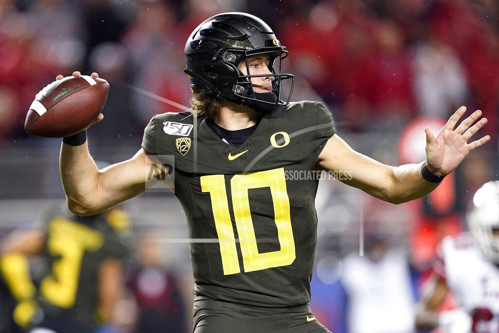 Tony Avelar Oregon quarterback Justin Herbert throws a pass against Utah during the second half of the Pac-12 Conference championship NCAA college football game in Santa Clara, Calif., Friday, Dec. 6, 2018. (AP Photo/Tony Avelar)