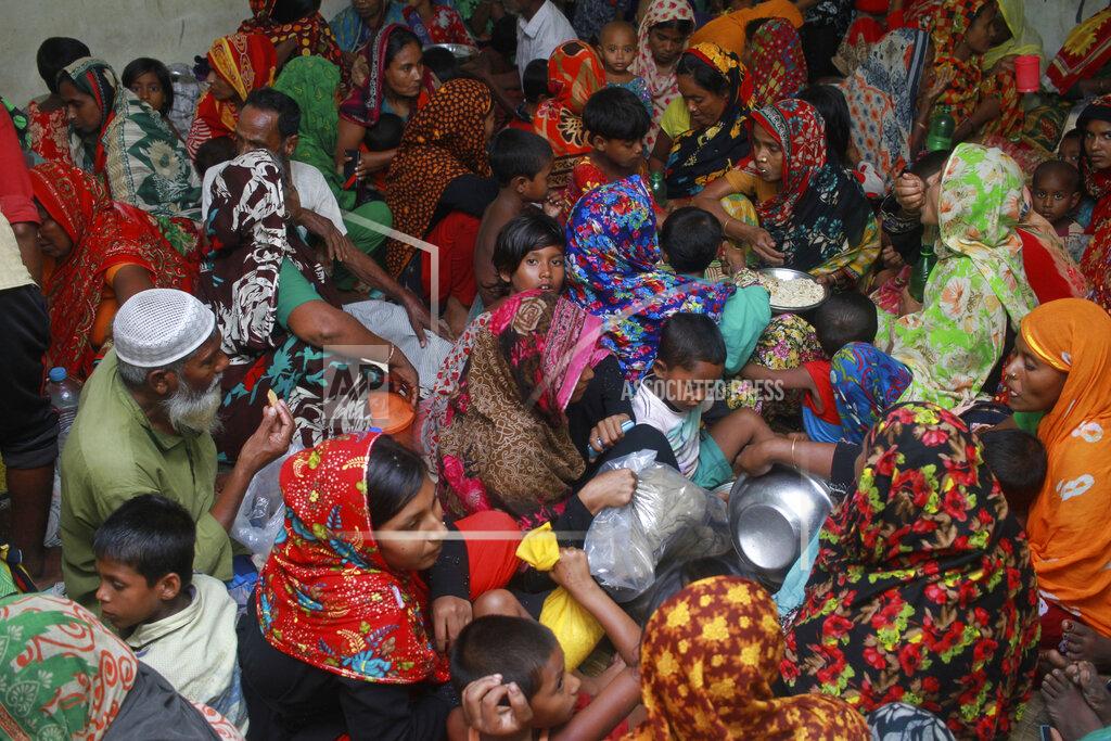 Abu Sufian Jewel In this Wednesday, May 20, 2020 photo, people crowd a shelter before Cyclone Amphan made landfall, in Shyamnagar, Shatkhira, Bangladesh. A powerful cyclone that slammed into coastal India and Bangladesh has left damage difficult to assess Thursday. (AP Photo/Abu Sufian Jewel)