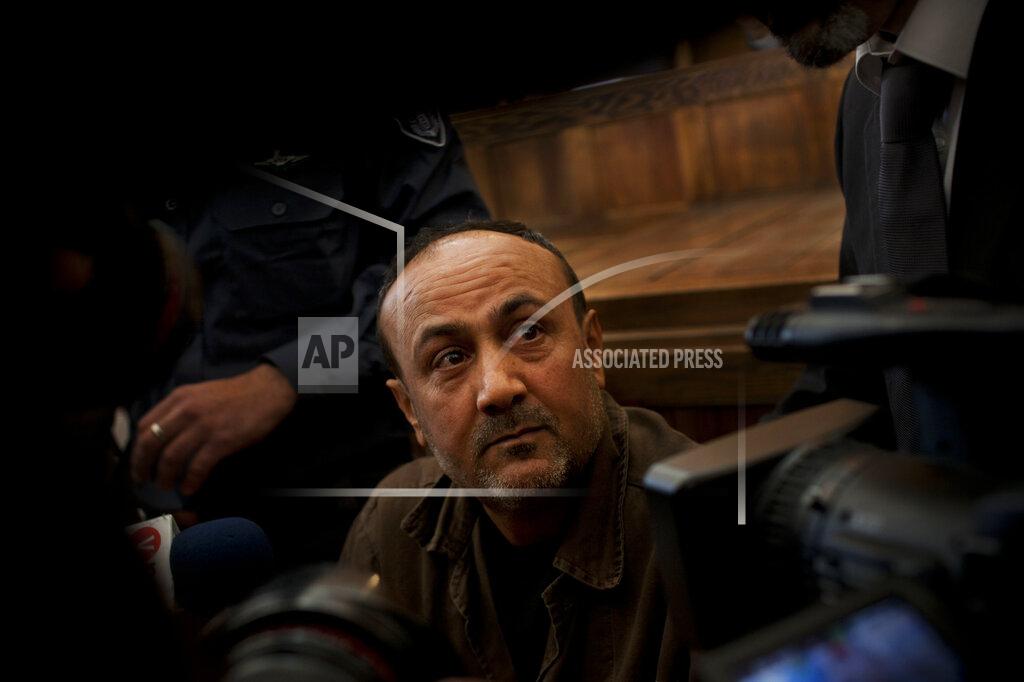 Bernat Armangue FILE - In this Jan. 25, 2012, file photo, senior Fatah leader Marwan Barghouti appears at Jerusalem's court. Palestinian President Mahmoud Abbas has announced that the first presidential and parliamentary elections since 2006 will be held later in 2021. The voting is seen as a key step in mending a rift between Abbas’ Fatah party that rules the West Bank and the Islamic militant group Hamas that controls the Gaza Strip. (AP Photo/Bernat Armangue, File)