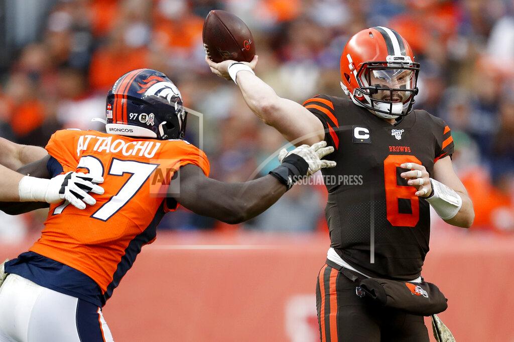 David Zalubowski Cleveland Browns quarterback Baker Mayfield (6) throws under pressure from Denver Broncos linebacker Jeremiah Attaochu (97) during the first half of NFL football game, Sunday, Nov. 3, 2019, in Denver. (AP Photo/David Zalubowski)