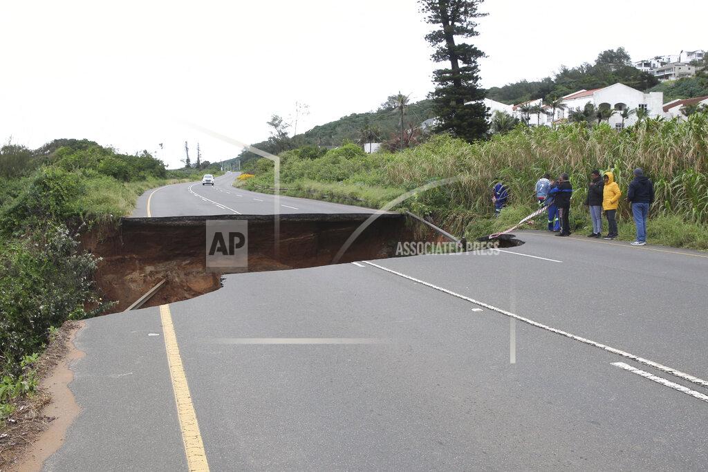 Uncredited A section of a road which has been washed away by flood waters near Durban, South Africa, Sunday, May 22, 2022. More than 300 people have been evacuated from their homes as a result of renewed heavy rains, flooding and mudslides in South Africa's KwaZulu-Natal province, weeks after severe flooding killed more than 400 people and displaced more than 40,000 others. (AP Photo)