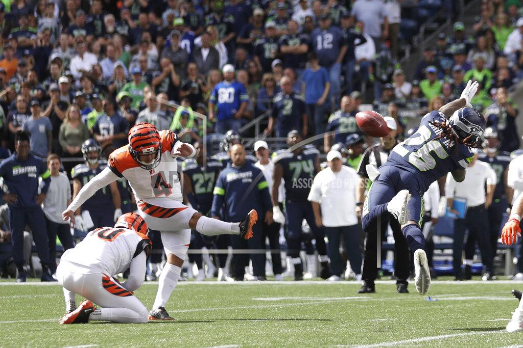 Stephen Brashear Cincinnati Bengals kicker Randy Bullock (4) kicks a field goal as Seattle Seahawks' Shaquill Griffin, right, attempts the block during the first half of an NFL football game Sunday, Sept. 8, 2019, in Seattle. (AP Photo/Stephen Brashear)
