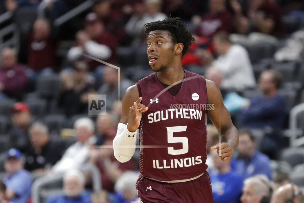 Jeff Roberson Southern Illinois' Lance Jones celebrates after making a 3-point basket during the first half of an NCAA college basketball game against Bradley in the quarterfinal round of the Missouri Valley Conference men's tournament Friday, March 6, 2020, in St. Louis. (AP Photo/Jeff Roberson)