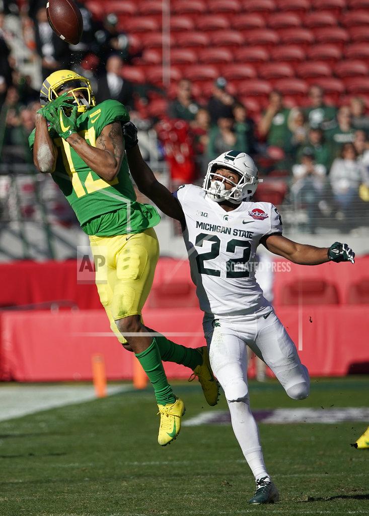 Tony Avelar Oregon wide receiver Dillon Mitchell (13) cannot make a catch against Michigan State cornerback Josiah Scott (22) during the first half of the Redbox Bowl NCAA college football game Monday, Dec. 31, 2018, in Santa Clara, Calif. (AP Photo/Tony Avelar)