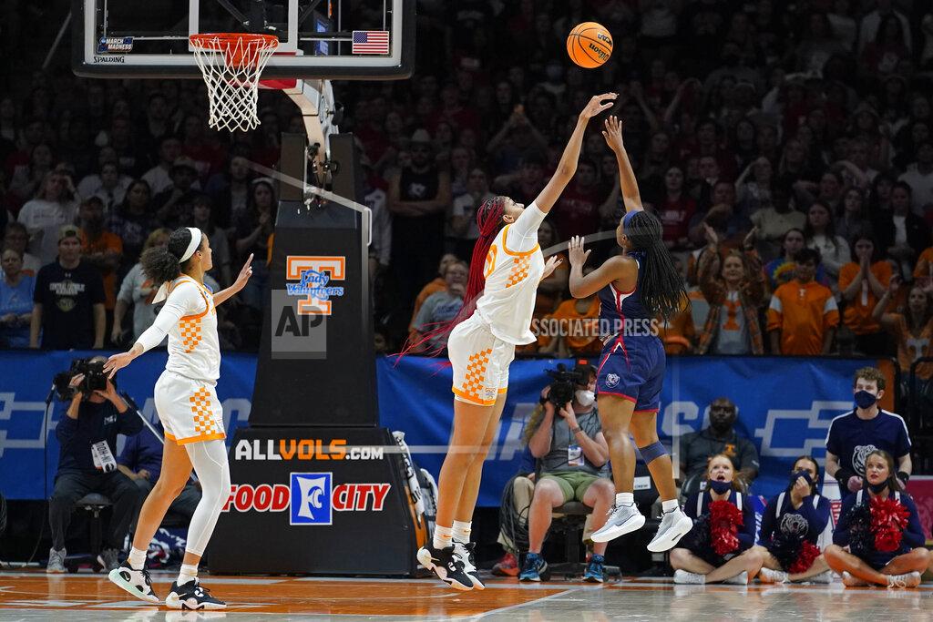 Mark Humphrey Tennessee's Tamari Key blocks a shot by Belmont's Destinee Wells, right, in the second half of a women's college basketball game in the second round of the NCAA tournament Monday, March 21, 2022, in Knoxville, Tenn. Tennessee won 70-67. (AP Photo/Mark Humphrey)