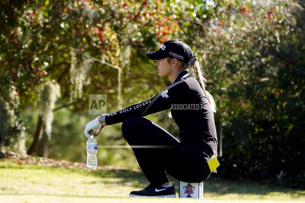 Eric Gay Nelly Korda sits on a tee marker on the 11th hole during a practice round for the U.S. Women's Open golf tournament, Tuesday, Dec. 8, 2020, in Houston. (AP Photo/Eric Gay)