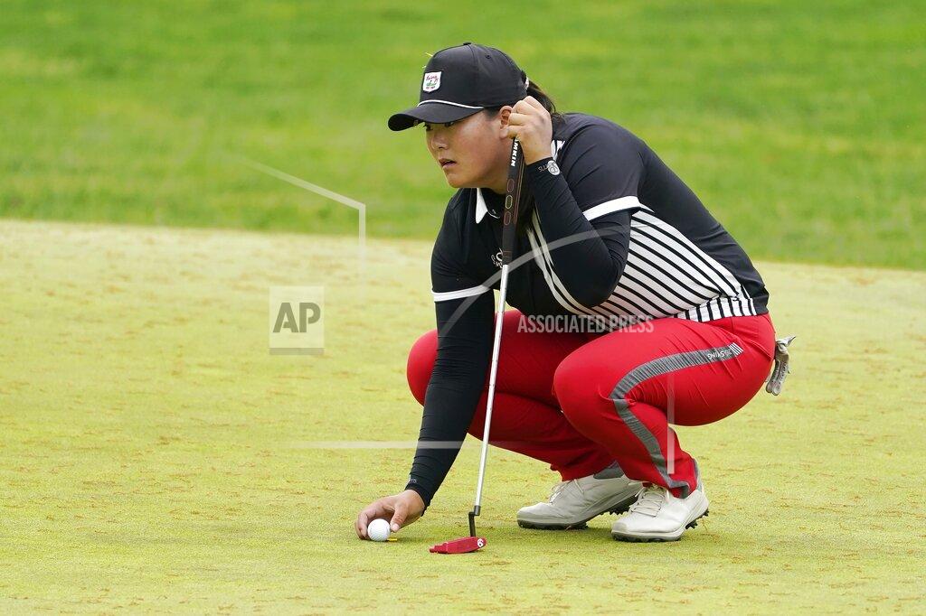 John Minchillo Angel Yin lines up a putt on the first green during the third round of the LPGA Cognizant Founders Cup golf tournament, Saturday, May 14, 2022, at the Upper Montclair Country Club in Clifton, N.J. (AP Photo/John Minchillo)