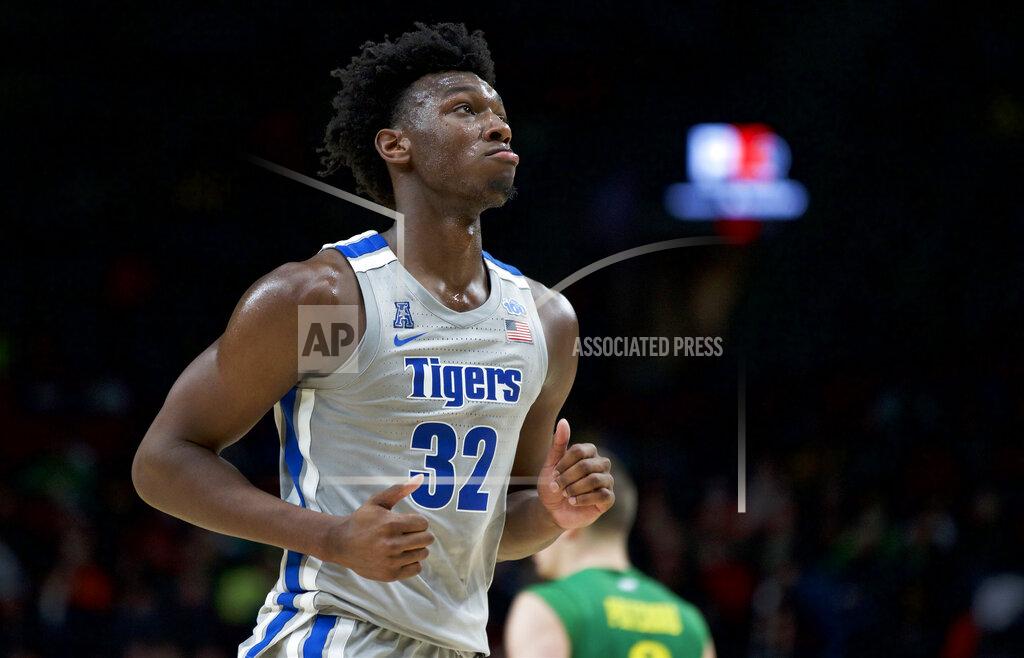 Memphis center James Wiseman runs off the court during the second half of an NCAA college basketball game against Oregon in Portland, Ore., Tuesday, Nov. 12, 2019. Oregon won 82-74. (AP Photo/Craig Mitchelldyer)