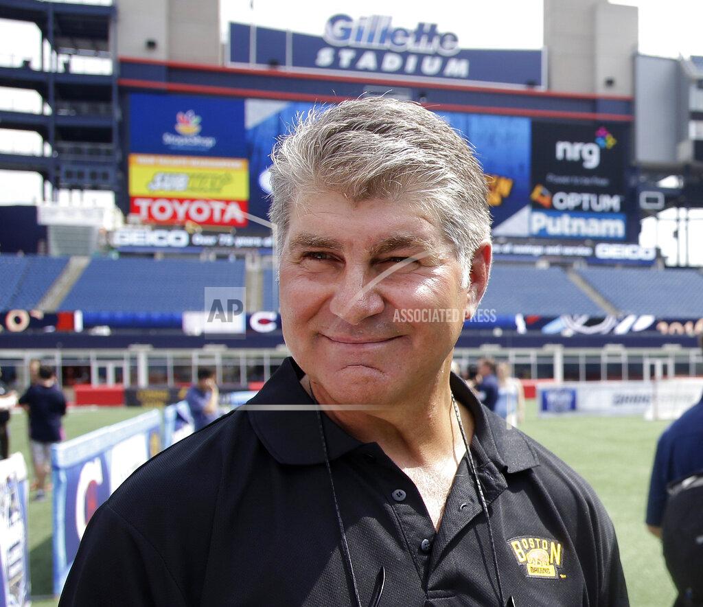 Stephan Savoia FILE - In this July 29, 2015, file photo, former Boston Bruins star Ray Bourque walks on the field during an event at Gillette Stadium in Foxborough, Mass. The former NHL star is apologizing for crossing a picket line to shop at a Massachusetts supermarket where workers are on strike. Bourque was caught on video exiting a North Andover Stop & Shop on Monday, April 15, 2019 as a worker said “Shame on you.” Thousands of Stop & Shop workers at 240 stores in Massachusetts, Connecticut and Rhode Island went on strike last week over what they say is an unfair contract proposal. (AP Photo/Stephan Savoia, File)