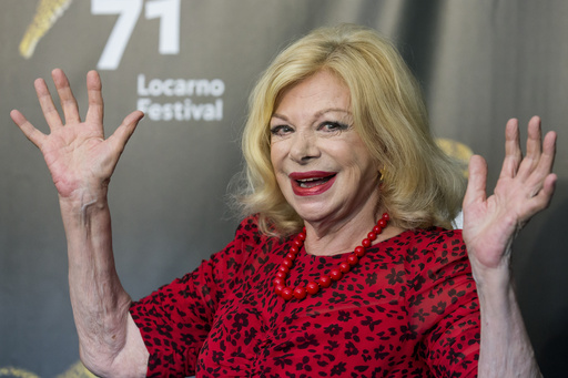 FILE - Italian actress Sandra Milo poses during a photocall for the film &quot;Un nemico che ti vuole bene&quot; during the 71st Locarno International Film Festival, Tuesday, Aug. 7, 2018, in Locarno, Switzerland. Sandra Milo, an icon of Italian cinema who played a key role in Federico Fellini&rsquo;s 8&frac12; and later became his muse, died Monday, Jan. 29, 2024, her family said. She was 90. (Alexandra Wey/Keystone via AP, File)
