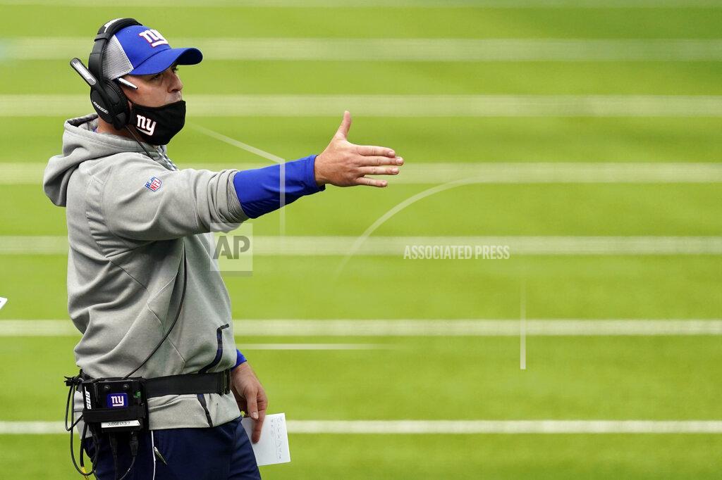 Ashley Landis New York Giants head coach Joe Judge instructs from the sideline during the first half of an NFL football game against the Los Angeles Rams Sunday, Oct. 4, 2020, in Inglewood, Calif. (AP Photo/Ashley Landis)