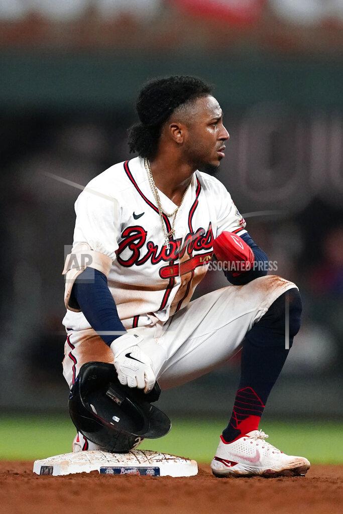 John Bazemore Atlanta Braves' Ozzie Albies (1) kneels at second base after being caught stealing in the fifth inning of a baseball game against the Colorado Rockies Tuesday, Sept. 14, 2021, in Atlanta. (AP Photo/John Bazemore)