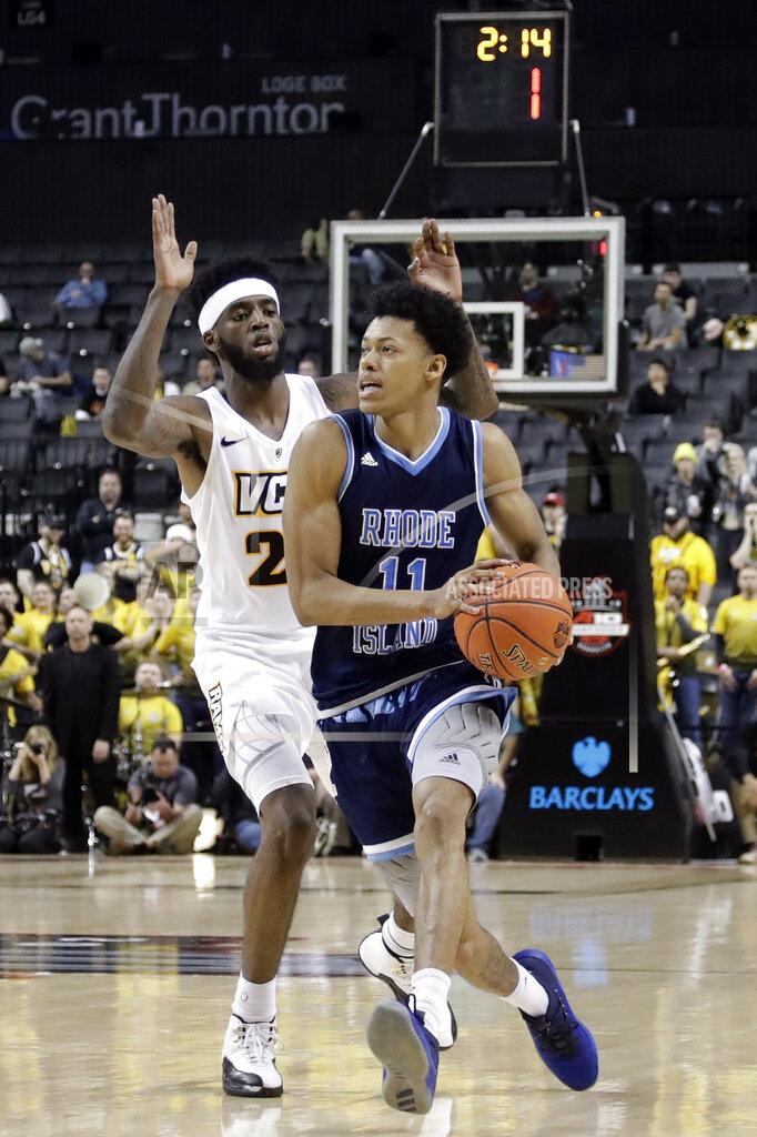 Frank Franklin Ii Rhode Island's Jeff Dowtin (11) drives past VCU's Michael Gilmore during the second half of an NCAA college basketball game in the Atlantic 10 men's tournament Friday, March 15, 2019, in New York. Rhode Island won 75-70. (AP Photo/Frank Franklin II)