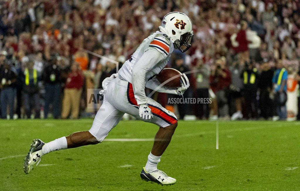 Vasha Hunt Auburn wide receiver Darius Slayton gets loose for a touchdown reception against Alabama during the second half of an NCAA college football game Saturday, Nov. 24, 2018, in Tuscaloosa, Ala. (AP Photo/Vasha Hunt)