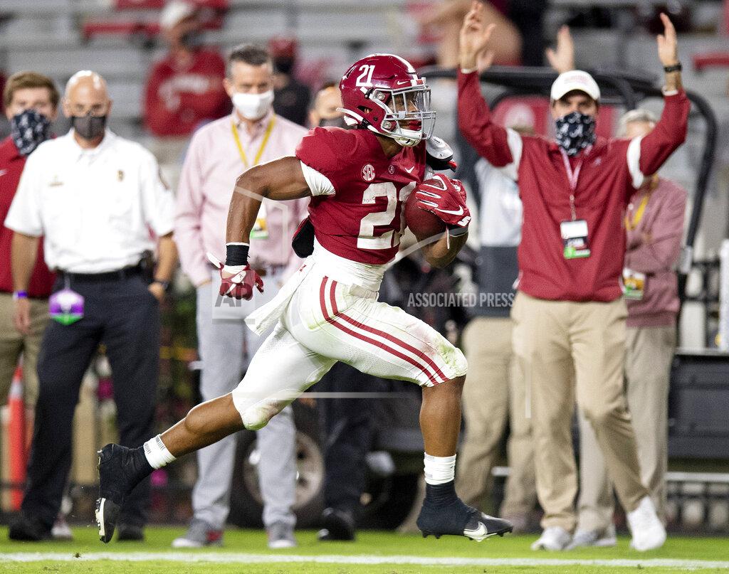Mickey Welsh Alabama running back Jase McClellan (21) scores a touchdown against Kentucky during an NCAA college football game Saturday, Nov. 21, 2020, in Tuscaloosa, Ala. (Mickey Welsh/The Montgomery Advertiser via AP)