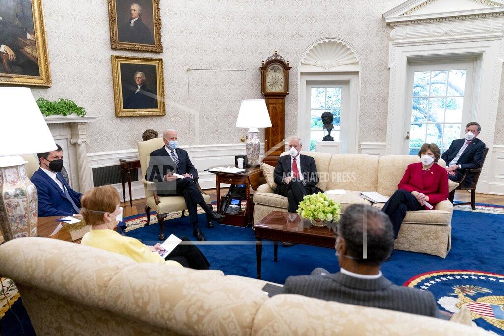 Andrew Harnik FILE - In this April 19, 2021, file photo, President Joe Biden meets with, from left, Transportation Secretary Pete Buttigieg, Rep. Kay Granger, R-Texas, Sen. Angus King, I-Maine, Rep. Emanuel Cleaver, D-Mo., Sen. Jeanne Shaheen, D-N.H., Sen. John Hickenlooper, D-Colo., and other members of congress to discuss his jobs plan in the Oval Office of the White House in Washington. The outreach to Congress is nothing new for presidents, but Biden is a veteran of Capitol Hill who knows how to tap the desire of even the most partisan legislators to legislate. (AP Photo/Andrew Harnik)