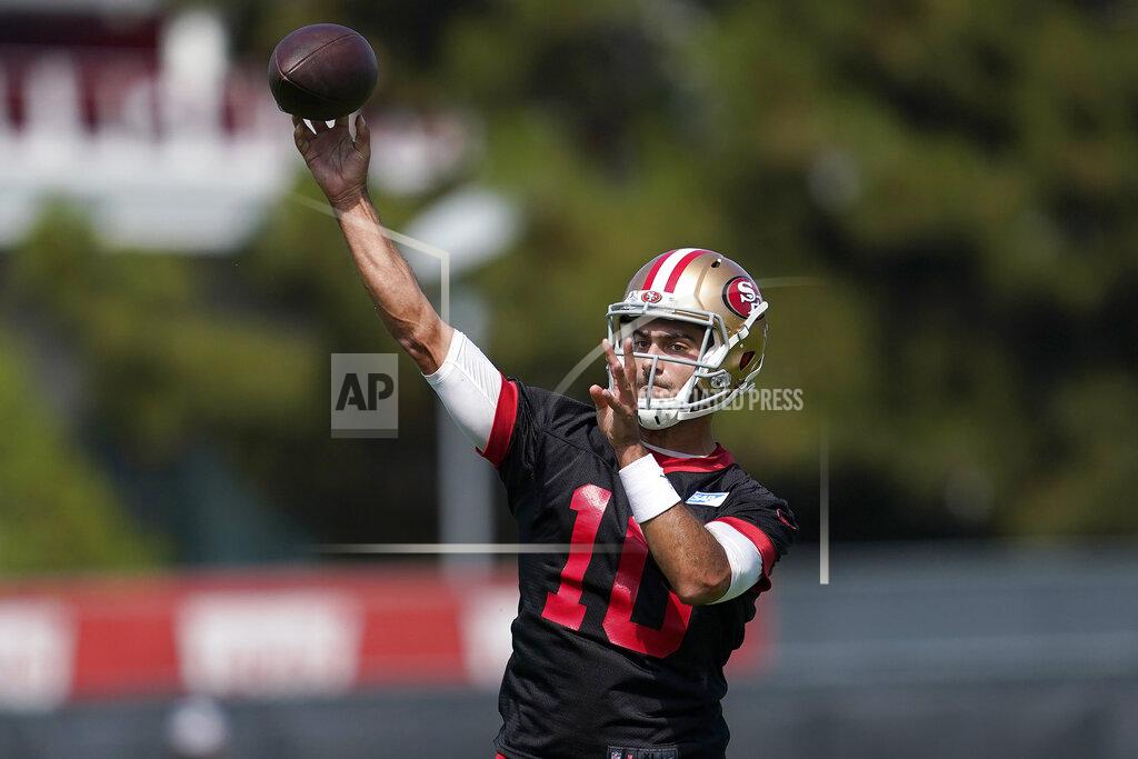 Jeff Chiu San Francisco 49ers quarterback Jimmy Garoppolo throws a pass at NFL football training camp in Santa Clara, Calif., Wednesday, July 28, 2021. (AP Photo/Jeff Chiu)