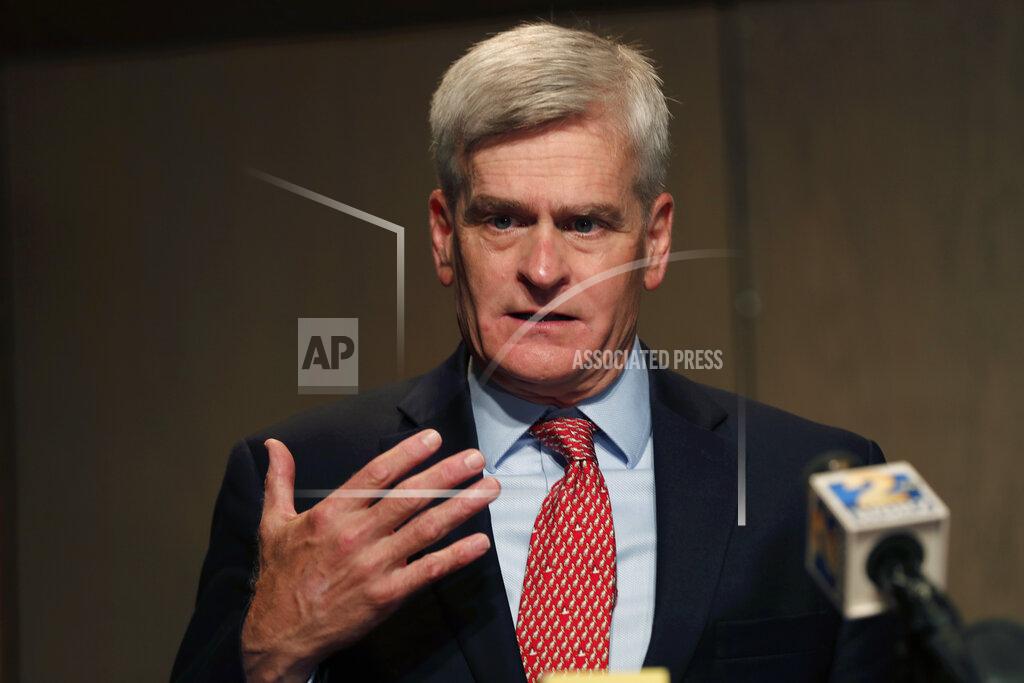 Gerald Herbert FILE - In this July 24, 2020, file photo, Sen. Bill Cassidy, R-La., delivers remarks to media after registering as a candidate to run as an incumbent in Baton Rouge, La. More than a dozen unions and citizens’ groups say unemployed workers will demonstrate at U.S. senators’ offices in nine Louisiana cities to demand continued $600 federal coronavirus unemployment benefits. Sens. Cassidy and John Kennedy are among Republicans supporting Majority Leader Mitch McConnell’s proposal to cut that benefit to $200 a week on top of state unemployment pay. (AP Photo/Gerald Herbert, File)