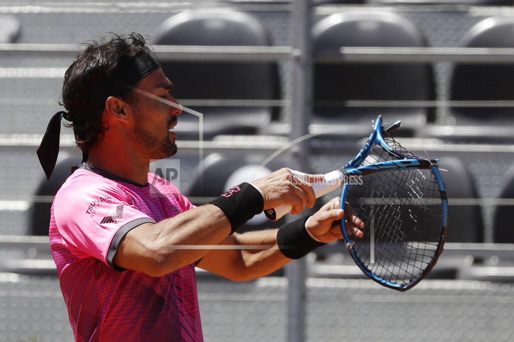 Gregorio Borgia Italy's Fabio Fognini breaks his racket on the court during his match against Japan's Kei Nishikori at the Italian Open tennis tournament, in Rome, Monday, May 10, 2021. (AP Photo/Gregorio Borgia)