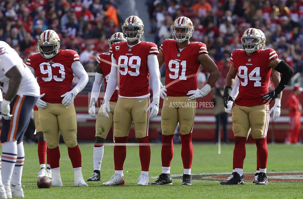 Jeff Chiu FILE - In this Dec. 23, 2018, file photo, San Francisco 49ers defensive tackle D.J. Jones (93), defensive end DeForest Buckner (99), defensive end Arik Armstead (91) and defensive end Solomon Thomas (94) wait at the line of scrimmage during the first half of the team's NFL football game against the Chicago Bears in Santa Clara, Calif. The 49ers traded Buckner and are looking to fill holes in the defensive line in the upcoming draft. (AP Photo/Jeff Chiu, File)