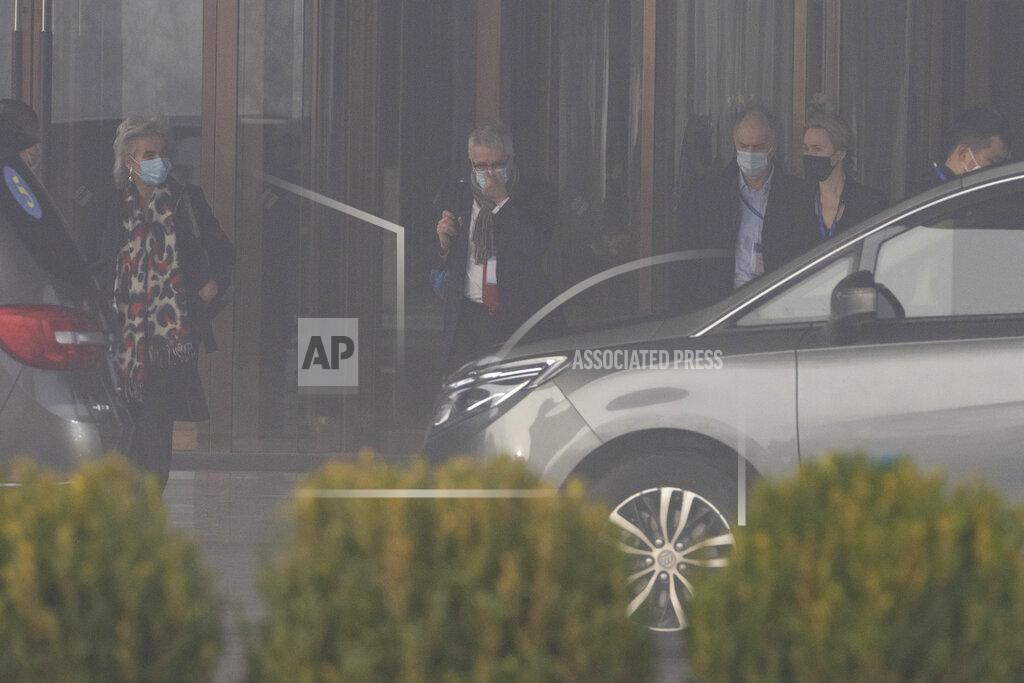 Ng Han Guan Members of a World Health Organization team leave their hotel on a foggy day for another day of field visit in Wuhan in central China's Hubei province on Wednesday, Feb. 3, 2021. The WHO team is investigating the origins of the coronavirus pandemic has visited two disease control centers in the province. (AP Photo/Ng Han Guan)