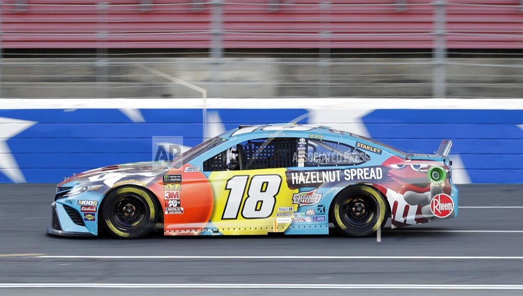 Chuck Burton Kyle Busch drives during qualifying for Saturday's NASCAR All-Star auto race at Charlotte Motor Speedway in Concord, N.C., Friday, May 17, 2019. (AP Photo/Chuck Burton)