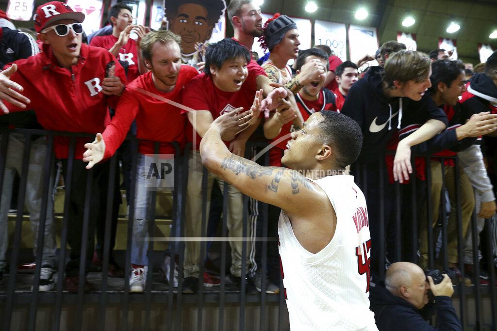 Michael Owens Rutgers guard Jacob Young celebrates with fans after Rutgers defeated Penn State in an NCAA college basketball game Tuesday, Jan. 7, 2020, in Piscataway, N.J. Rutgers won 72-61. (AP Photo/Michael Owens)