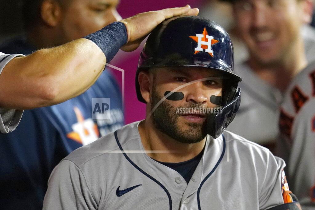 Marcio Jose Sanchez Houston Astros' Jose Altuve gets a pat on his helmet after hitting a two-run home run during the fifth inning of a baseball game against the Los Angeles Angels Tuesday, Sept. 21, 2021, in Anaheim, Calif. (AP Photo/Marcio Jose Sanchez)