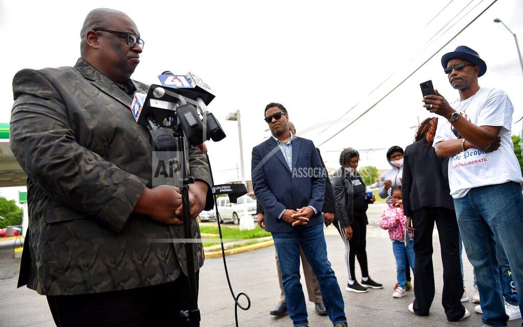 Jill Toyoshiba Darron LaMonte Edwards, left, of United Believers Community Church, talks to the media Tuesday, June 1, 2021, after the family of Malcolm Johnson provided a video of the fatal shooting by police of Johnson at the BP gas station at E. 63rd and Prospect Avenue in March. Faith leaders called it an "execution." Rev. Emanuel Cleaver III of St. James United Methodist Church, center, also spoke. (Jill Toyoshiba/The Kansas City Star via AP)