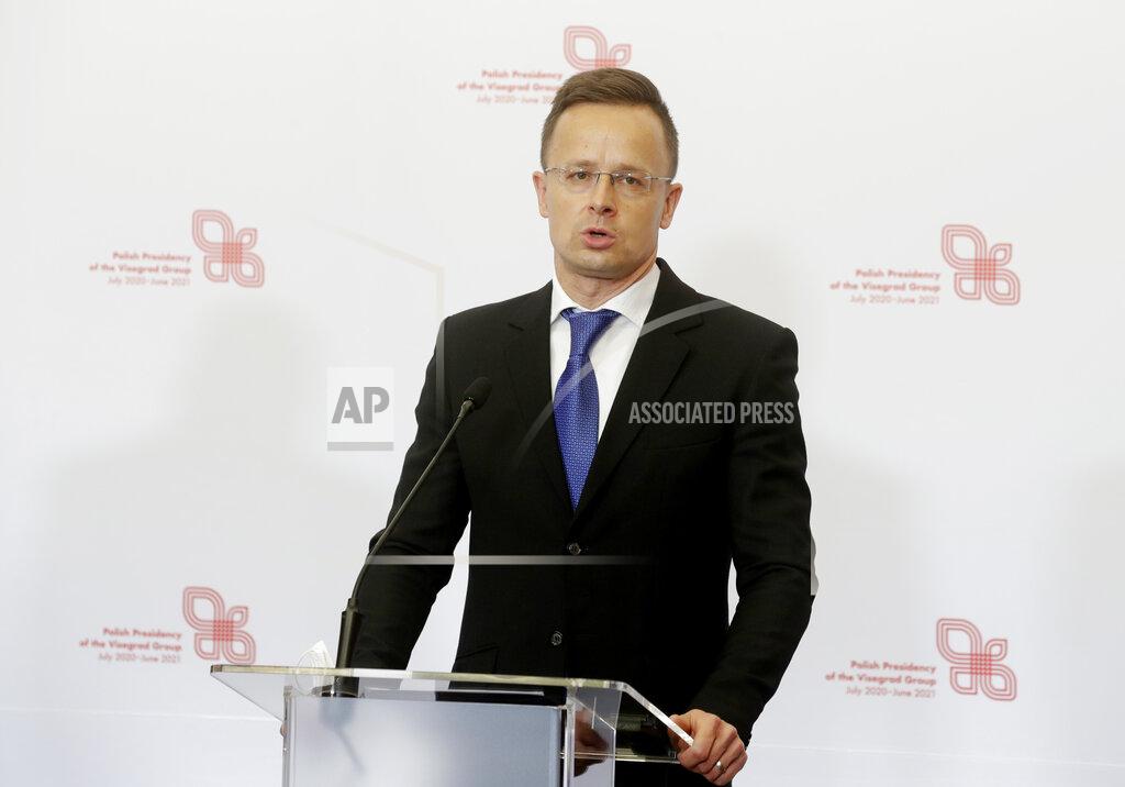 Czarek Sokolowski Hungarian Foreign Minister Peter Szijjarto attends a press conference after the foreign ministers of the Visegrad Group ,V4, in Lodz, Poland, Friday, May 14, 2021. (AP Photo/Czarek Sokolowski)