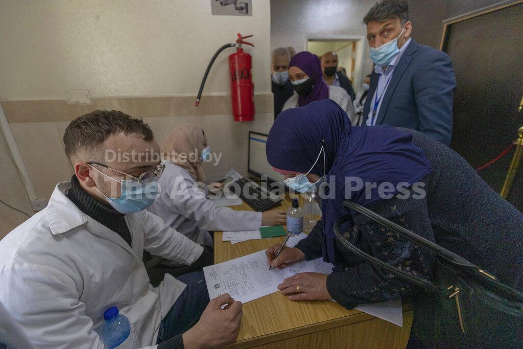 Palestinians expand vaccination campaign after UN COVAX program  delivers shipment