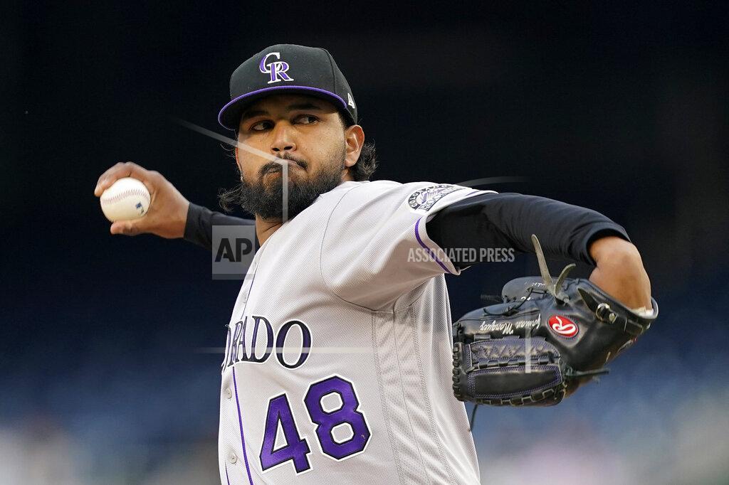 Patrick Semansky Colorado Rockies starting pitcher German Marquez throws to the Washington Nationals in the first inning of a baseball game, Thursday, May 26, 2022, in Washington. (AP Photo/Patrick Semansky)