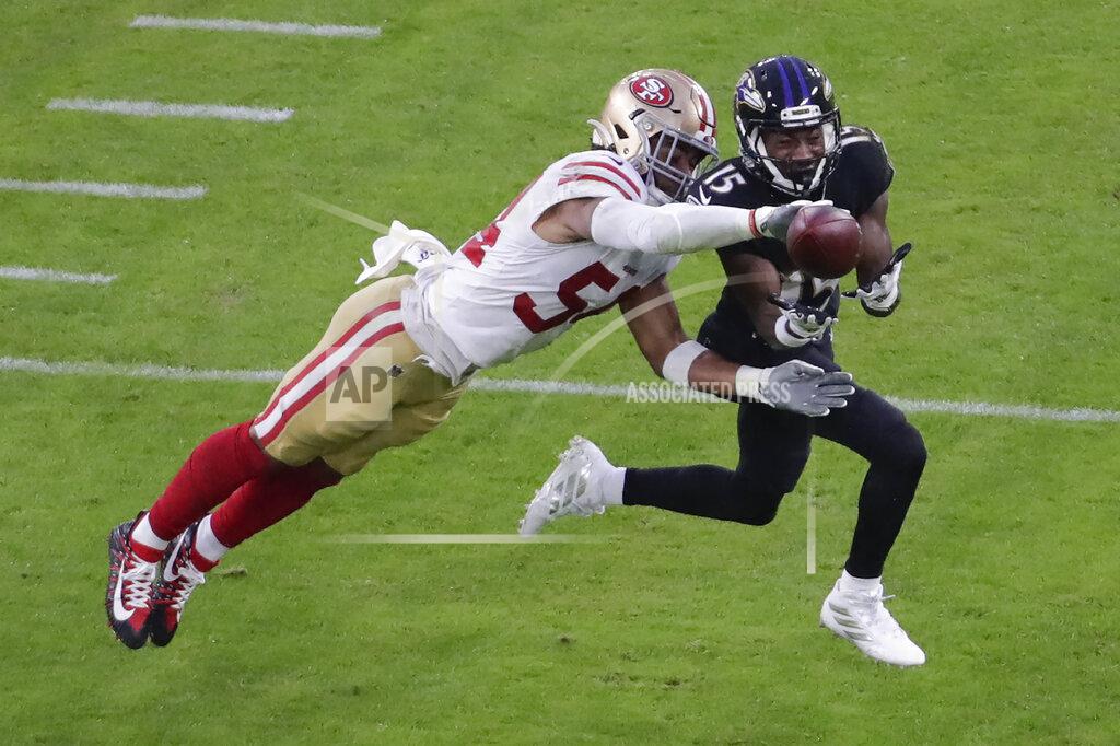 Julio Cortez San Francisco 49ers middle linebacker Fred Warner (54) blocks Baltimore Ravens wide receiver Marquise Brown (15) from catching the ball during the first half of an NFL football game, Sunday, Dec. 1, 2019, in Baltimore, Md. (AP Photo/Julio Cortez)