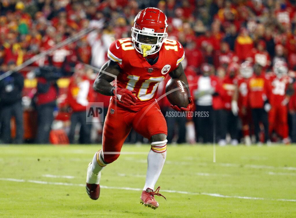 Charlie Riedel FILE - In this Dec. 13, 2018, file photo, Kansas City Chiefs wide receiver Tyreek Hill (10) runs with the ball during the first half of the team's NFL football game against the Los Angeles Chargers in Kansas City, Mo. The Chiefs are investigating an incident in which Hill was involved in a domestic battery episode in suburban Kansas City earlier this week. The team said in a statement to The Associated Press that it was aware of a police report filed Thursday, March 14, by the Overland Park Police Department that lists Hill’s address and identifies a juvenile as the victim. Hill’s fiancee, Crystal Espinal, is identified among “others involved.” (AP Photo/Charlie Riedel, File)