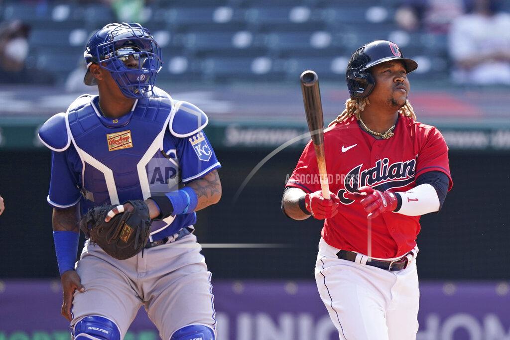 Tony Dejak Cleveland Indians' Jose Ramirez, right, watches his ball along with Kansas City Royals catcher Salvador Perez after Ramirez hit a two-run home run in the eighth inning of a baseball game, Wednesday, April 7, 2021, in Cleveland. The Indians won 4-2. (AP Photo/Tony Dejak)